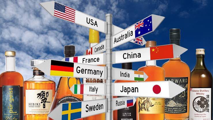 A flight of whiskies representing whiskey tastings around the world