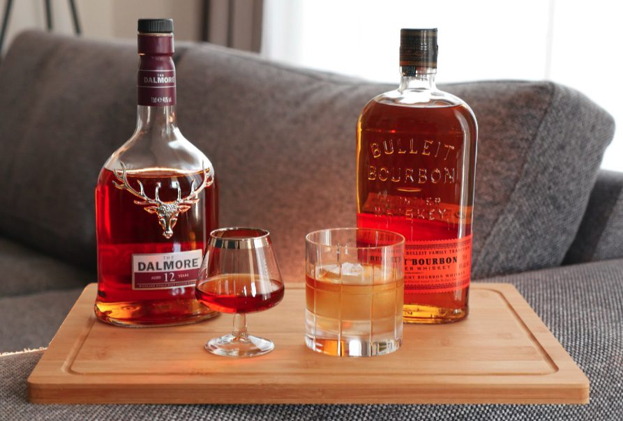 Comparison of Bourbon vs Scotch bottles and ingredients