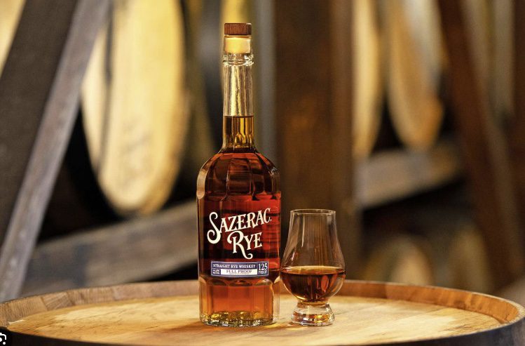 The Sazerac cocktail recipe served in a rocks glass with lemon peel