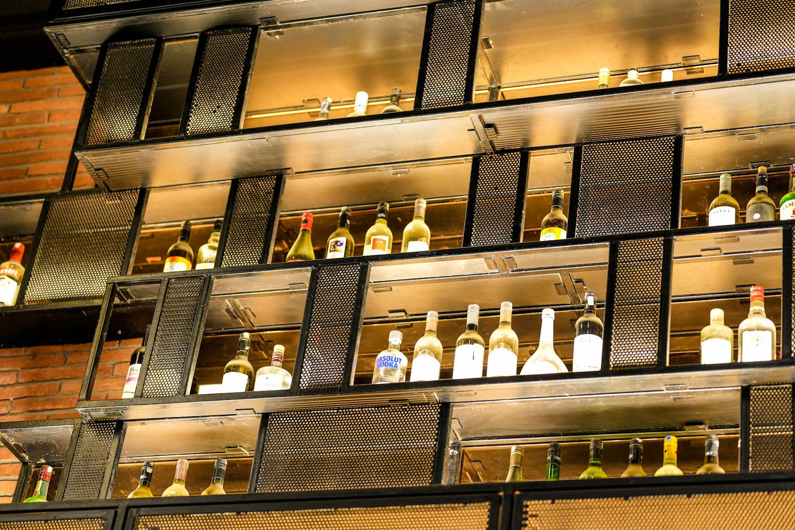 A collection of whisky bottles stored properly on a shelf