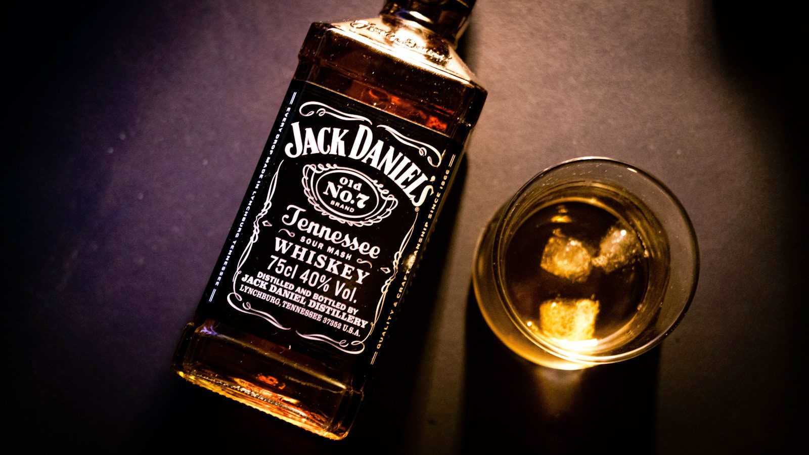 Tennessee Whiskey vs Bourbon comparison with Jack Daniels bottle