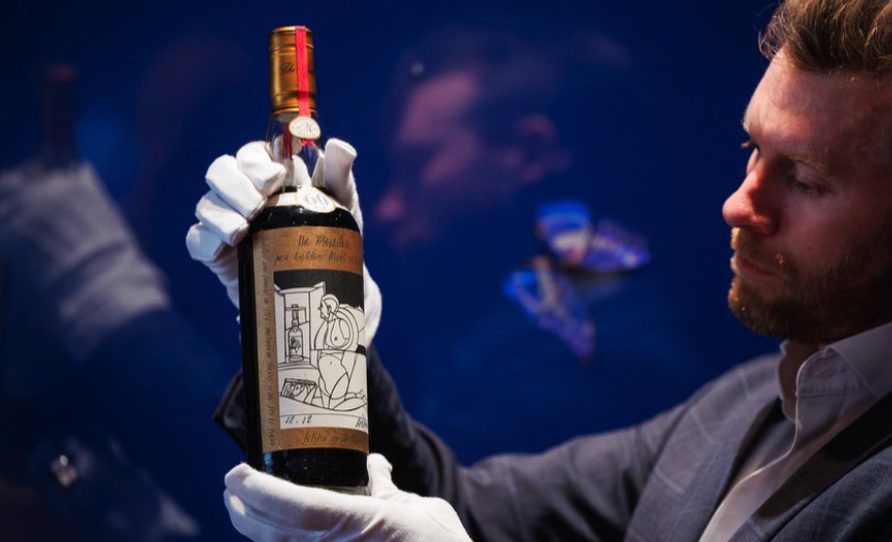 Rare Macallan investment bottles displayed in a luxury cabinet